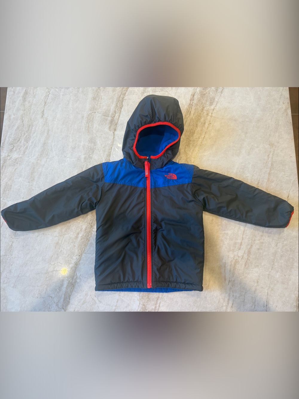 The North Face Kids Hooded Puffer Jacket in Black, Blue & Red Trim